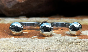 a new ring style for men featuring 10.5mm diameter sterling silver caps