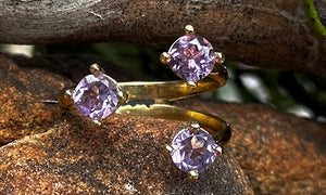 front view of a 14k gold plated ring with light Amethyst crystals 