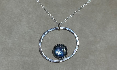 Silvertone glass necklace